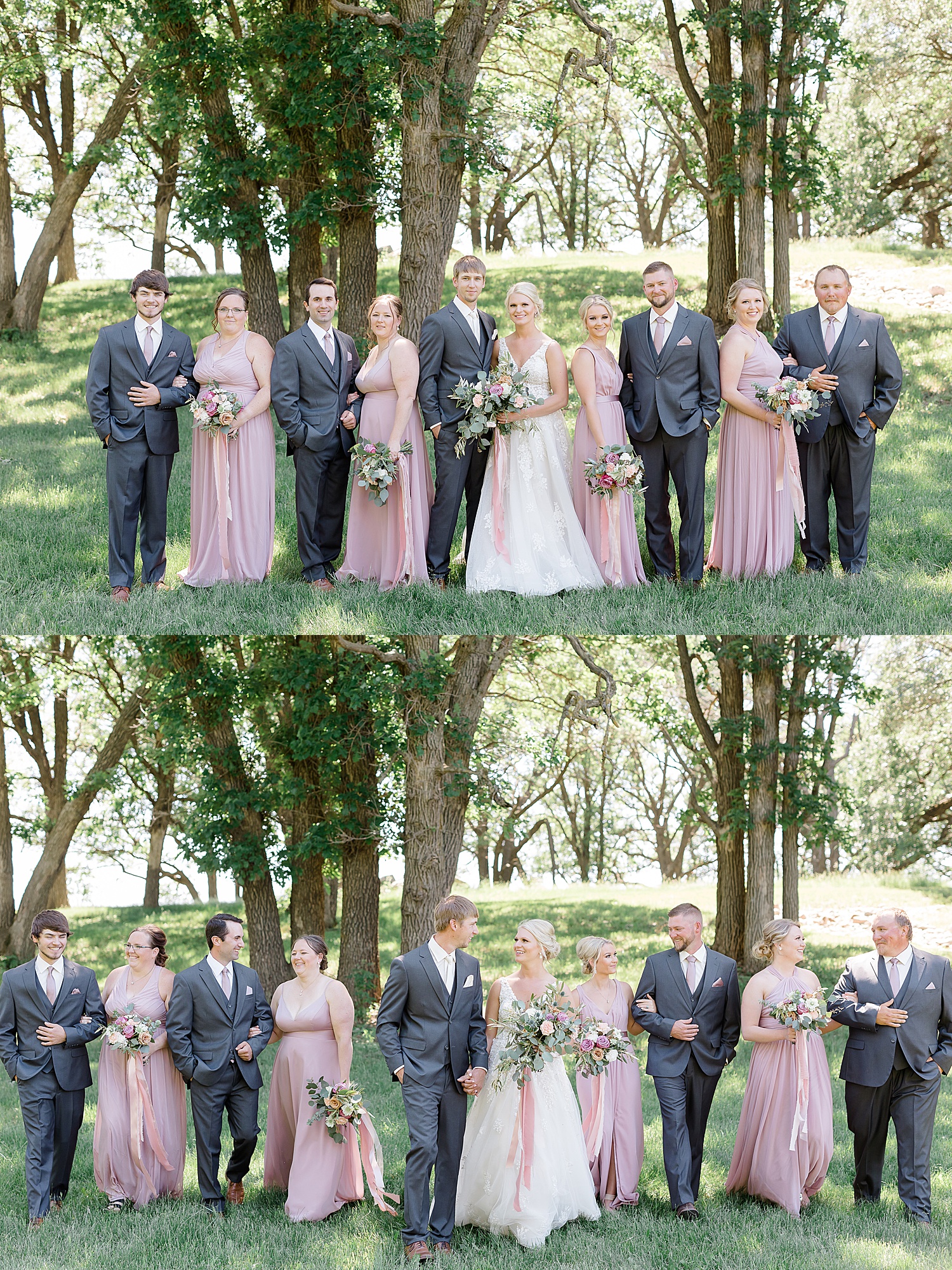 Large wedding party in pink and gray standing in a field 