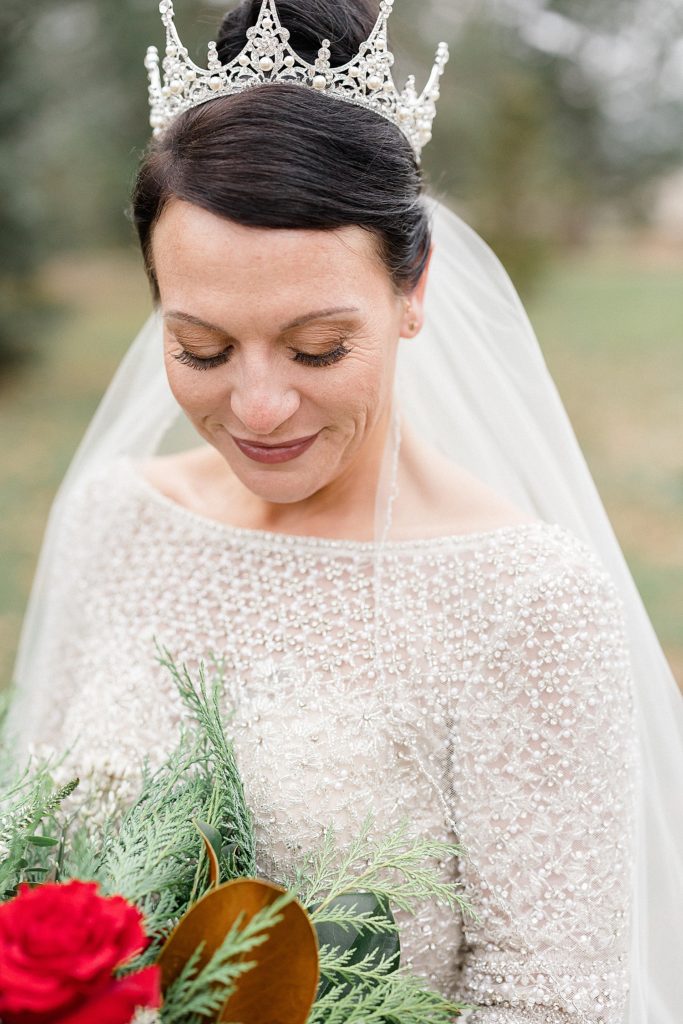Bride with tiara and flowers before her Minneapolis Como Park Zoo & Conservatory Wedding