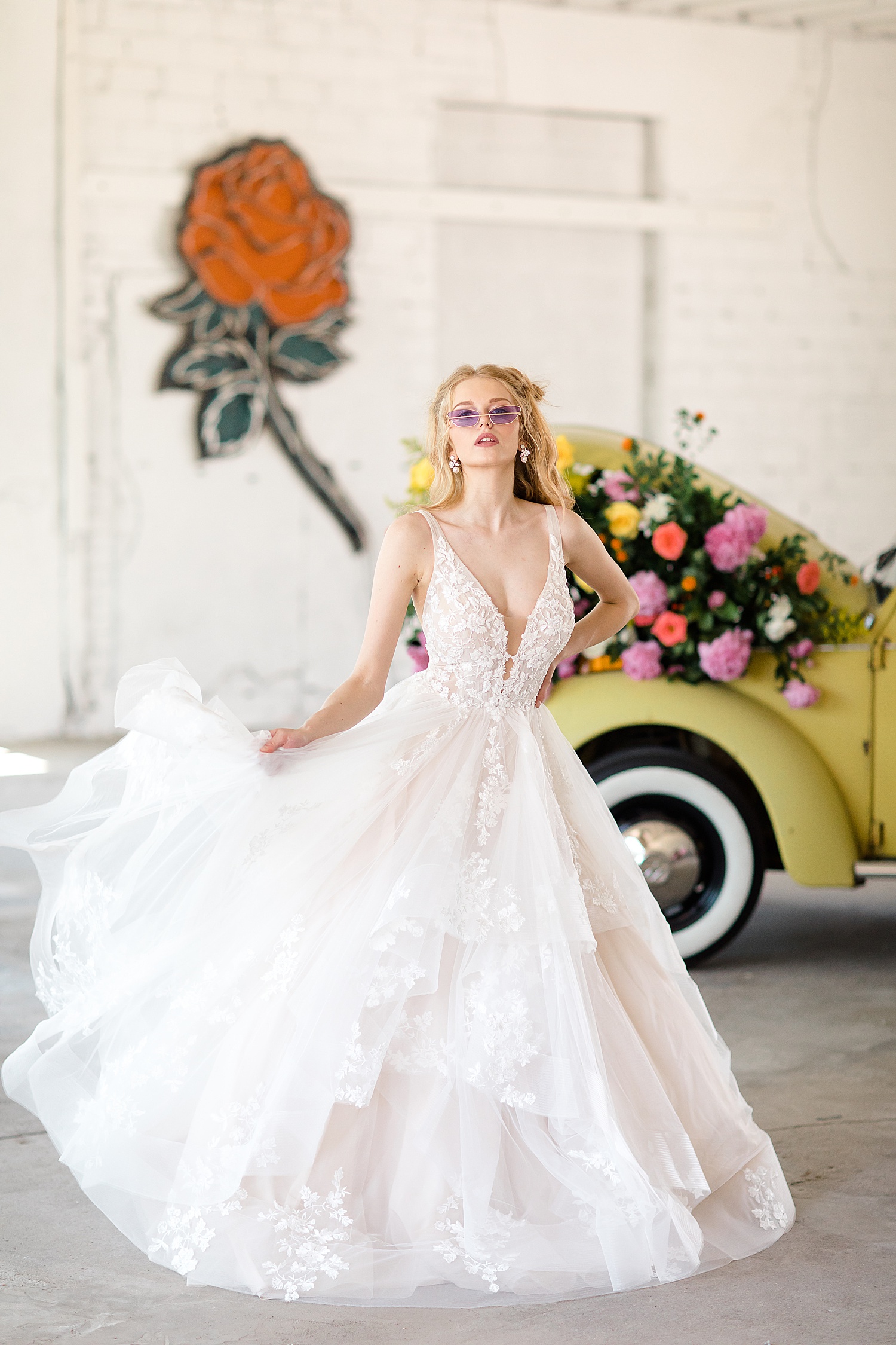 bride in long lace gown for Volkswagen spring shoot in warehouse